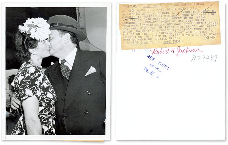 Item #61938 7" x 9" Black-and-White Photograph of Jackson Kissing His Wife. Robert H. Jackson.